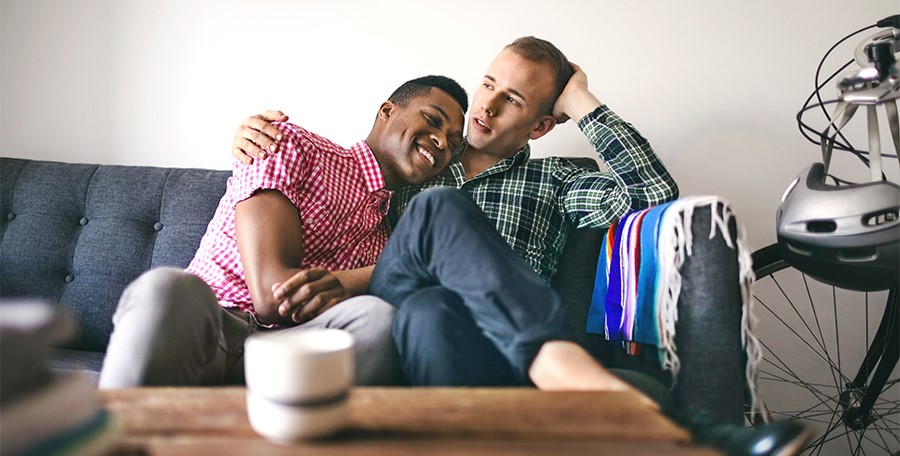 Two men sitting on a couch